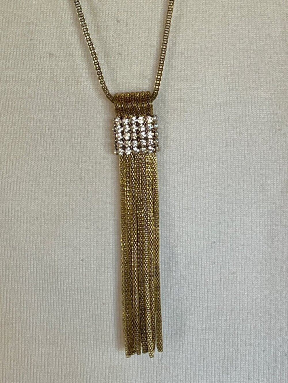 Antiqued gold/rhinestone tassel necklace